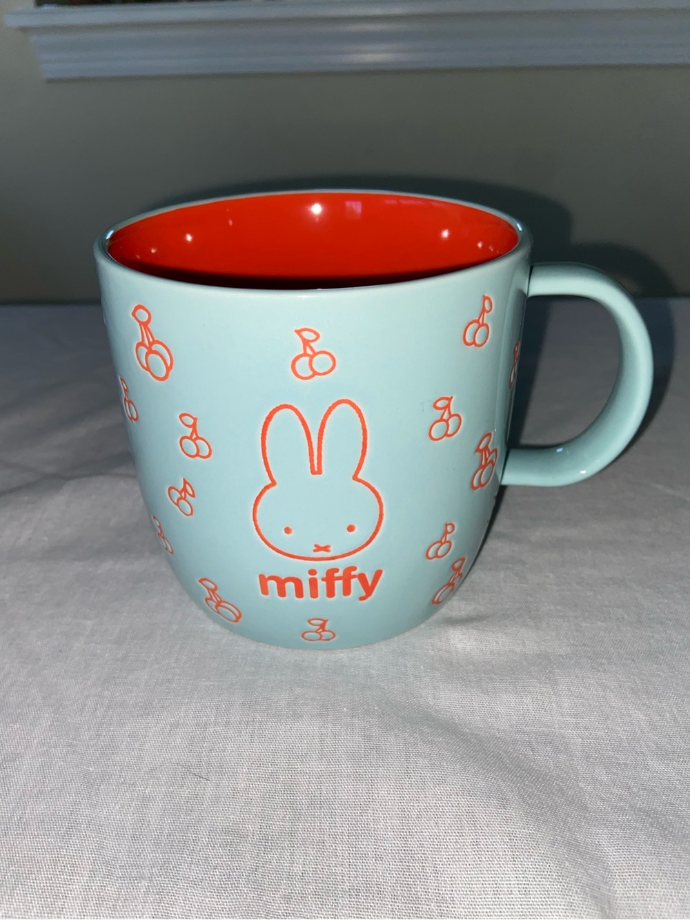miffy Light Blue Mug with Bright Orange Interior and Print